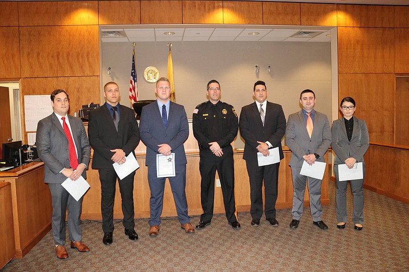 From left,  Jordon Corona of Northfield, Trayon Zito of Mays Landing, Clint Pearson of Linwood, Sheriff Eric Scheffler, Adrian Ramos-Vazquez of Hammonton, Anthony Paulsgraf of Galloway Township and Natalie Divanovic of Ventnor.