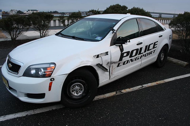 An alleged drunk driver sideswiped this Longport patrol vehicle, injuring a Longport police officer.