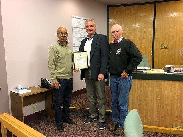 From left, Longport Mayor Nicholas Russo, retiring Tax Assessor Jeffrey Hesley and Commissioner Jim Leeds.