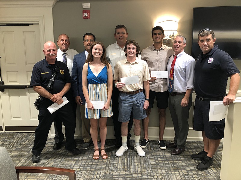 Members of the Margate Fire Department and Board of Commissioners pose the the 2019 O'Hara-McCormick Memorial Scholarship recipients.