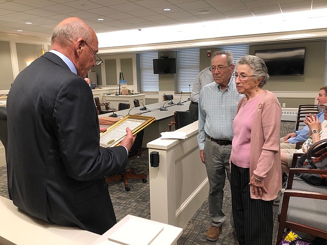 Margate Mayor Michael Becker presents a proclamation to the Save Lucy Committee honoring its 50th year as caretaker of Lucy the Elephant. SLC President Davida Ross and her husband Martin Ross accept the award.