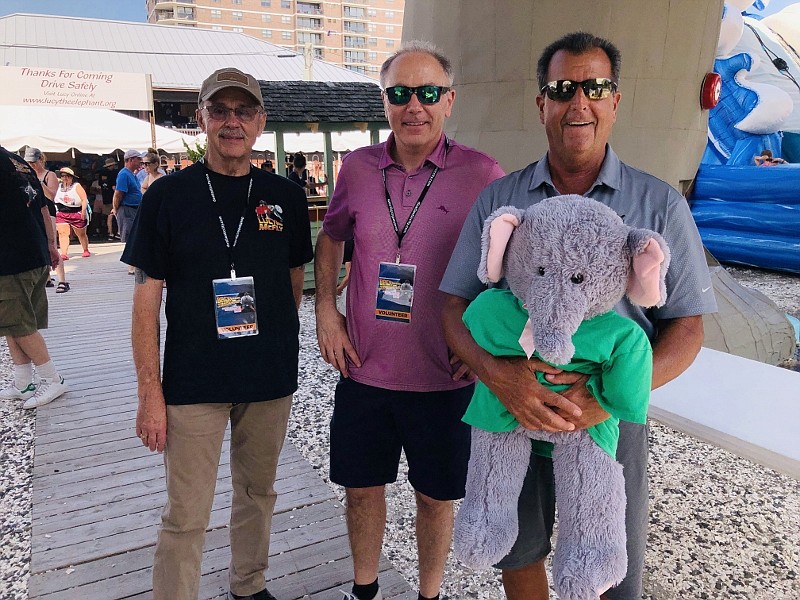 From left, John Armato, Vince Mazzeo and Margate Commissioner John Amodeo at Lucy's birthday party last summer.