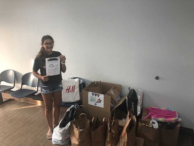 Seventh grader Olivia Stone delivered $1,500 worth of school supplies to the Longport Police Department for distribution to students in need.