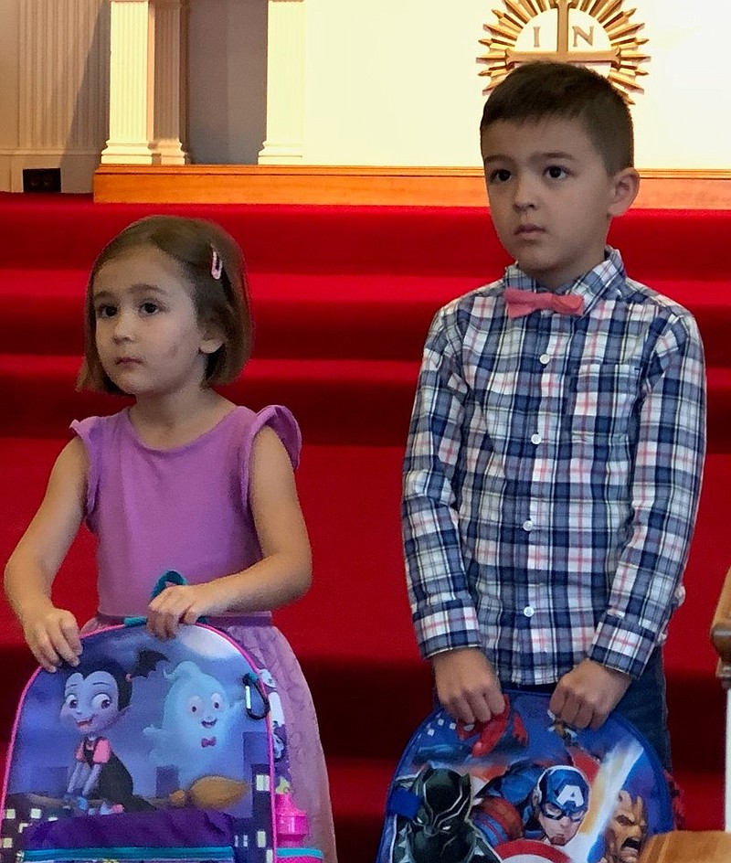 Children at Margate Community Church had their bookbags blessed for the school year.