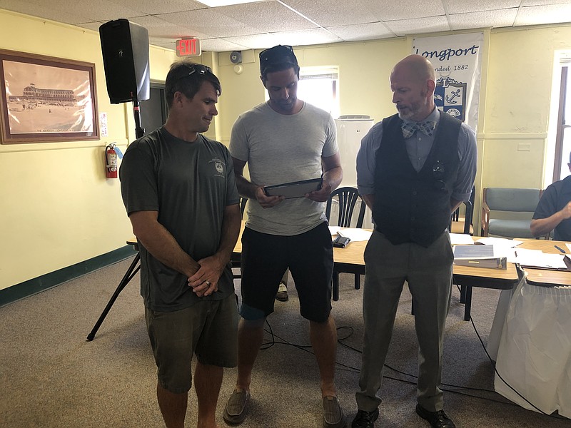 From left, Sean Duffey, Mike McGrath, Longport Beach Patrol Chief Matt Kelm.
