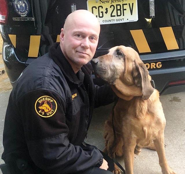 K9 Luke with his handler Sheriff's Officer Joseph Kleinow.