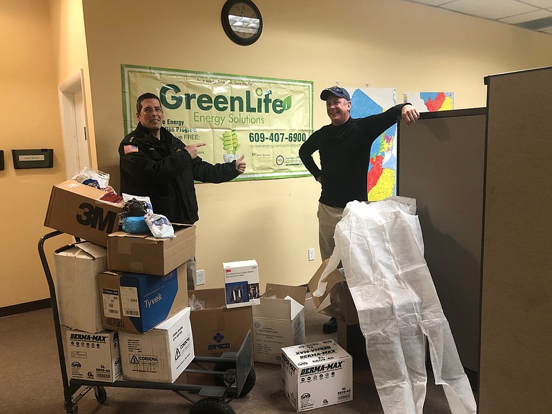 Atlantic County Sheriff Eric Scheffler and Ed Ryan of Greenlife Energy Solutions of Egg Harbor Township.