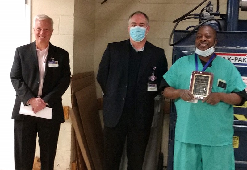 Storeroom Inventory Control Specialist Michael Thompson of Atlantic City was named Shore Medical Center's April 2020 Employee of the Month for his role in ensuring staff have the products and personal protective equipment they need to perform their role safely.  Pictured with Michael (left to right) is Shore's VP of Human Resources, Alan Beatty and Shore's Administrative Director of Logistics, Bob Robertson 