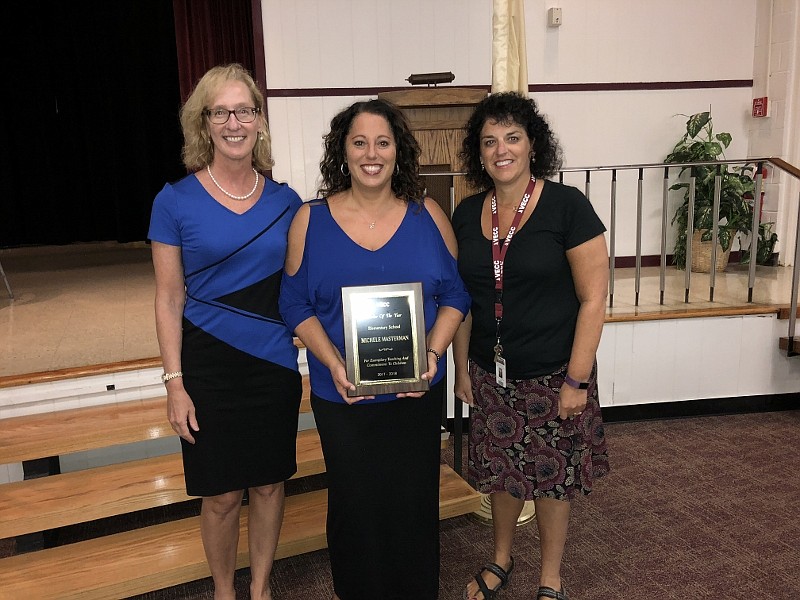 From left, Superintendent Eileen Johnson, 2018 Teacher of the Year Michele Masterman and Elementary School Principal Carmela Somershoe.