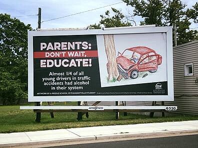 Provided/Winner from previous PSA contest artwork display on billboard on Main Street in Pleasantville.
