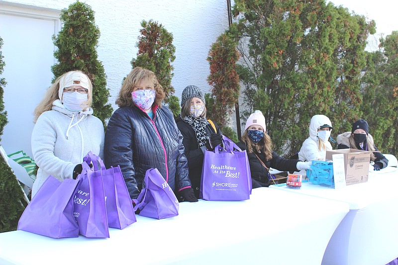 Volunteers take a break from registering golfers at Shore Medical Center's A Cause to Celebrate Golf Tournament benefiting cancer care held at Greate Bay Country Club Nov. 2. The tournament raised $206,000. Pictured from left is Lisa DiTroia, South Dennis; Sue Marino, Linwood; Bonnie Hamilton, Egg Harbor Township; Barbara Ridge, Linwood; Fran Kaplan, Margate; and Mary McGuckin, Ocean City.