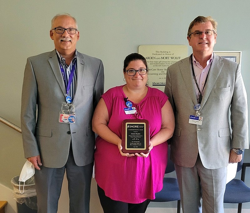 Jennie Bradeis, director of Patient Financial Services (center), is the recipient of Shore's most recent Leadership Profile Award. 