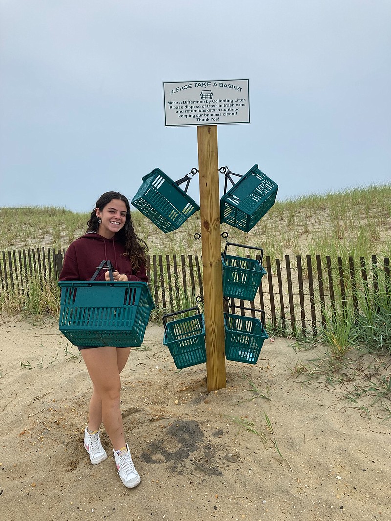 Ventnor resident Christina Barbella poses with her first "beach tree" in Margate.