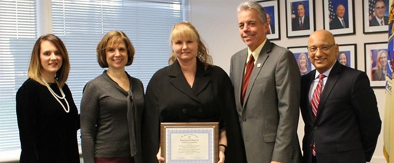 Loreen Cohen, second from left, helped the Tighe School gain national Blue Ribbon status.