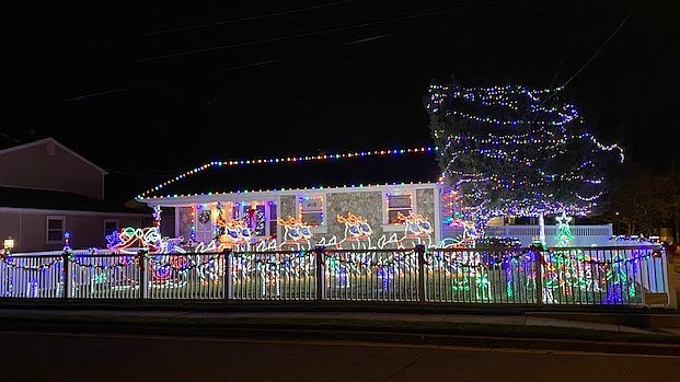 Santa and his sleigh and reindeer.