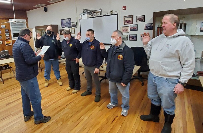 Longport Commissioner of Public Safety Dan Lawler swears in 2022 officers of the Longport Volunteer Fire Department, Jan. 31, 2022.