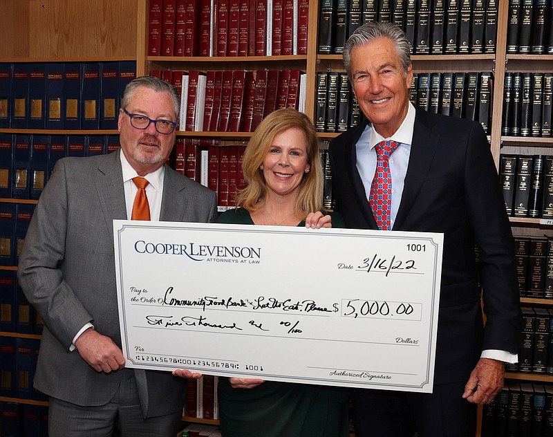 From left, Kenneth J. Calemmo Jr., Denise Hladun and Lloyd Levenson.