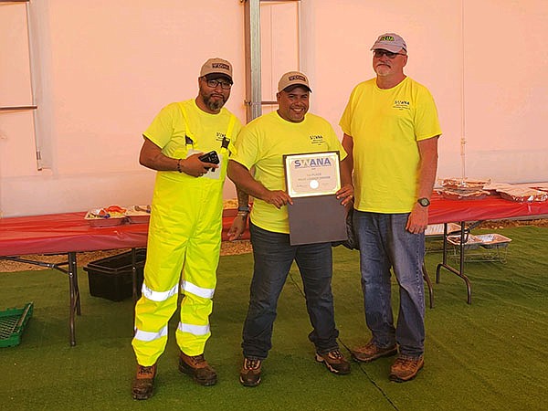 Provided/From left, ACUA Equipment Operator II Jonathan Santana, Driver Ramon Nazario and Solid Waste Director Gary Conover 