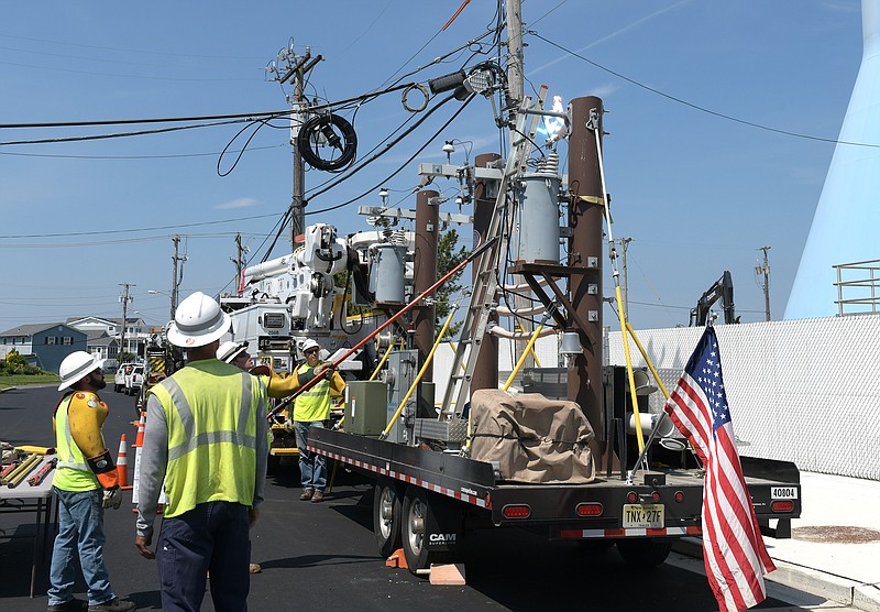 Provided/Atlantic City Electric line workers perform an interactive presentation on electrical safety using the company's safety trailer as part of a summer readiness news conference held June 2 in Brigantine. 