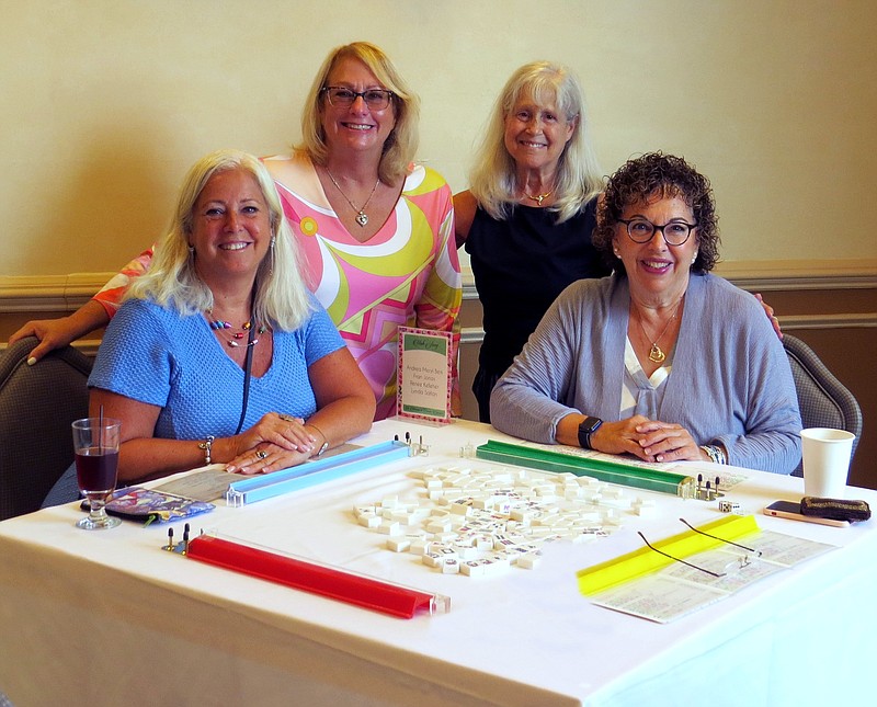 Provided/From left, Andrea Berk, Renee Kelleher, Lynda Safian, and Fran Jonas participate in last year's JFS Card Party.