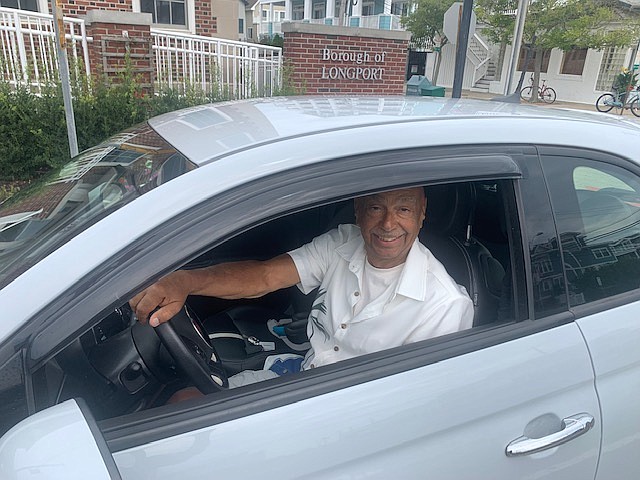 Longport Mayor Nicholas Russo drives a Fiat 500 electric vehicle.