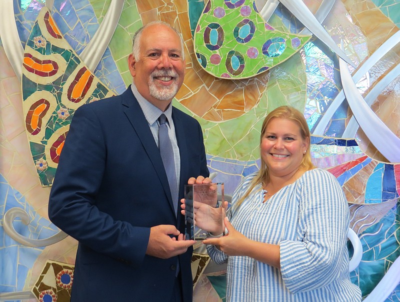 From left, Ken Mosca of Atlantic City Electric, and Beth Joseph, Jewish Family Service of Atlantic & Cape May Counties.