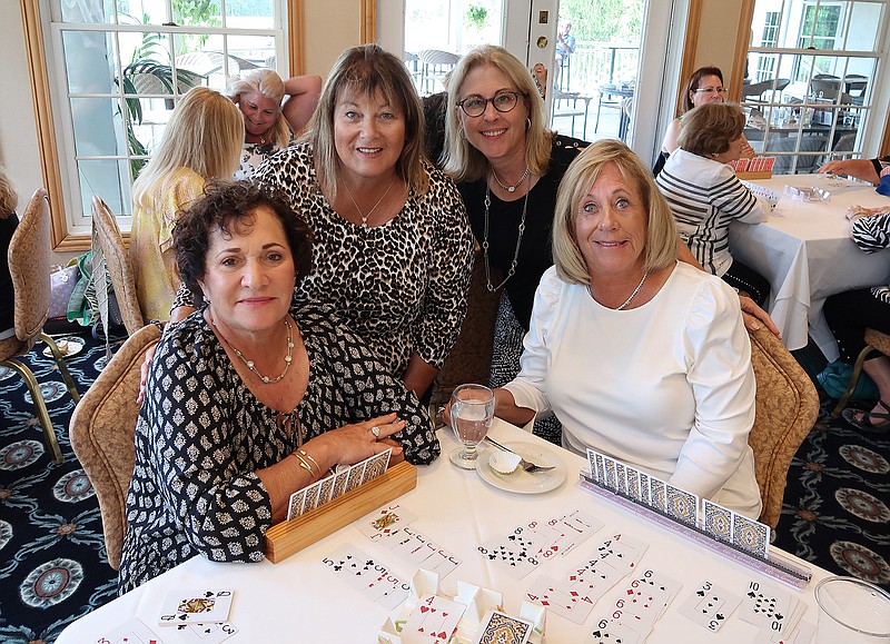 From left, Gloria Tragbar, Miriam Hirsch, Susan Lang, and Bonnie Spector participated in the Jewish Family Service Card Party at Harbor Pines Golf Club on Aug. 25. They enjoyed an afternoon playing Canasta and dined on a buffet lunch as well as had a chance to win door prizes and bid on auction items.