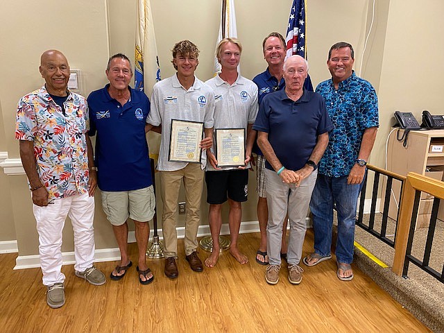 From left, Longport Mayor Nicholas Russo, Coach Joe Haney, swimmers James Haney, Patrick Armstrong, his dad Patrick Armstrong, and Commissioners Jim Leeds and Dan Lawler.