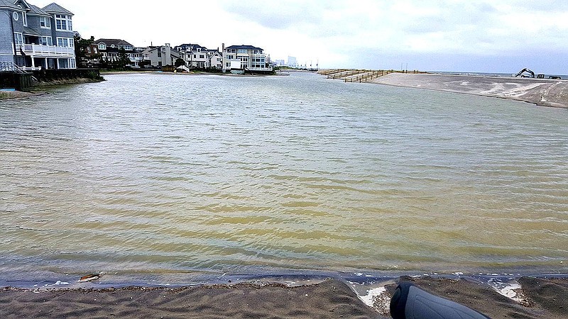 Margate City Fire Department/Flooding behind the dune in July 2017.