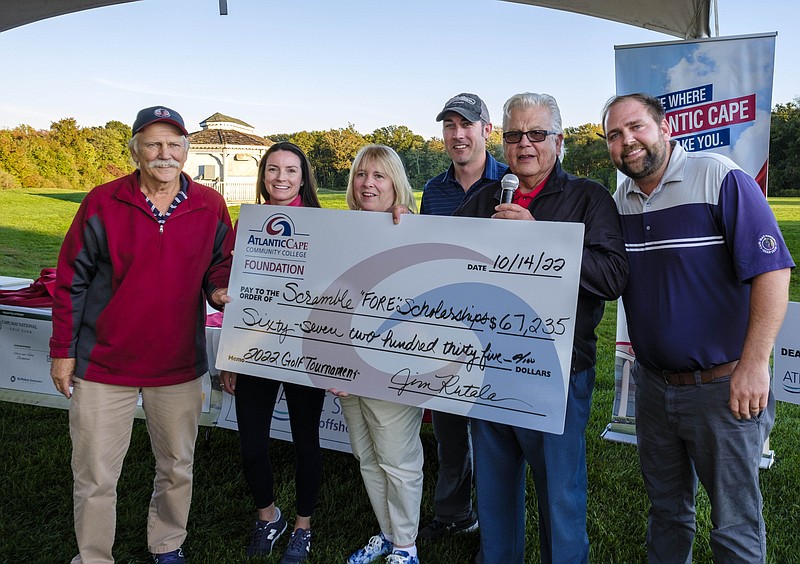 Provided/The record setting check is presented to Atlantic Cape Foundation's Scramble 'FORE' Scholarships.