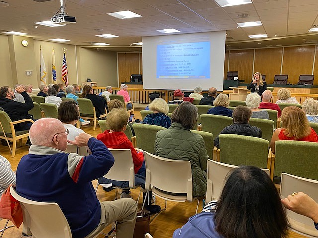 FBI Senior Agent Jessica Weisman speaks to seniors at a Longport Library lunch and learn about hot to protect themselves against elder fraud during a recent event sponsored by the Longport Public Library.