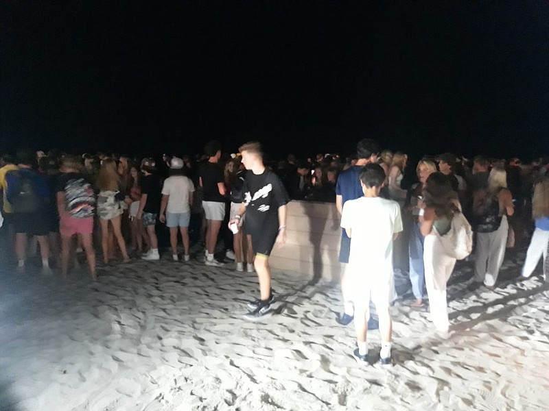 Teens on the beach in Ocean City.