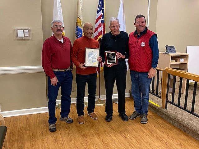 From left, Longport Volunteer Fire Chief Levon "Lefty" Clayton, Mayor Nicholas Russo, retiring employee and Fire Capt. Richard Hersch Jr. and Commissioner Dan Lawler.