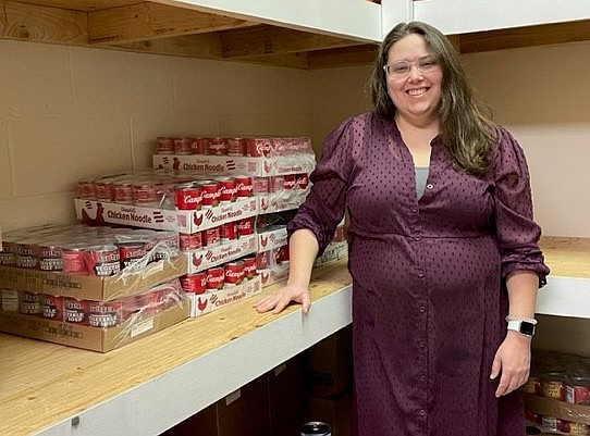 Provided/Volunteer Services Supervisor Vanessa Smith showcases canned soups in the agency food pantry. Canned soups will be collected through Feb. 17 at the JFS Food Pantry, 607 N. Jerome Ave.

