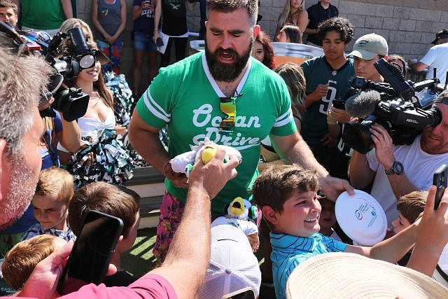 Young fans take selfies with Jason Kelce during his celebrity appearance in Sea Isle last June for an autism awareness fundraiser.