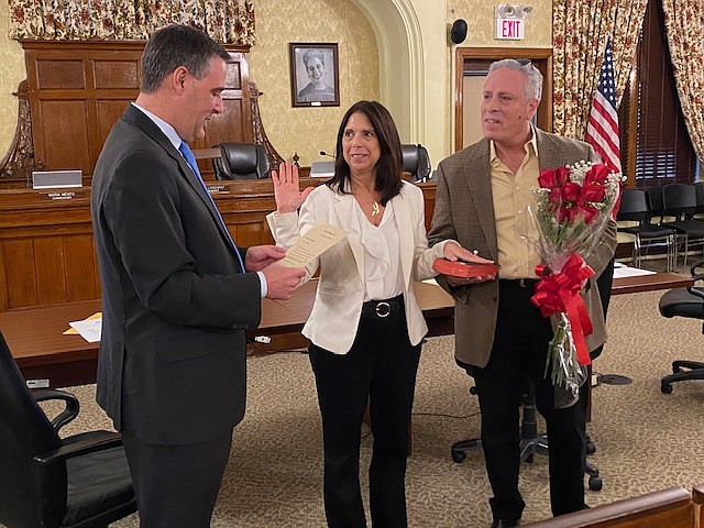 NJ Sen. Vince Polistina swears in Maria Mento as Ventnor City Commissioner as her friend Michael Goloff holds the Bible.