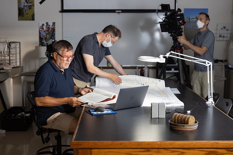 Provided/Stephen Nagiewicz, left, an adjunct instructor of Marine Science at Stockton University, is filmed by a crew for an episode of the National Geographic TV show Drain the Oceans.'