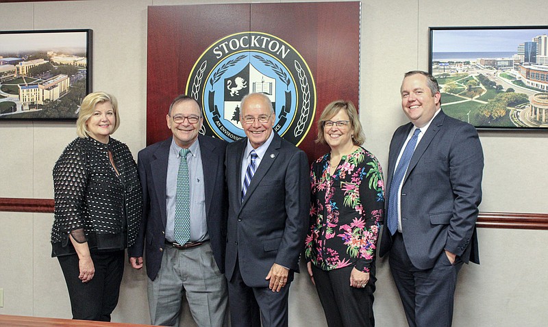 Stockton Photo by Lizzie Nealis/From left, Brigid Callahan Harrison, the chair of the Stockton University Foundation; Richard Elmore, a former Stockton professor and husband of Elizabeth Elmore; Stockton President Harvey Kesselman; Susan Davenport, executive vice president and chief of staff; and Dan Nugent, vice president for University Advancement and executive director of the University Foundation.