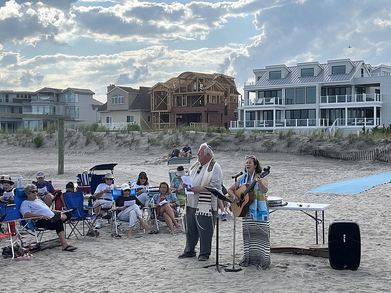 Rabbi Feshbach and Cantor Harrison lead the service on the Huntington Ave. beach in Margate.