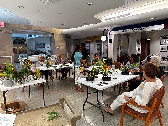 Seashore Gardens supporters attend an Ikebana flower arranging class at the Boardwalk at Seashore Gardens Living Center. 