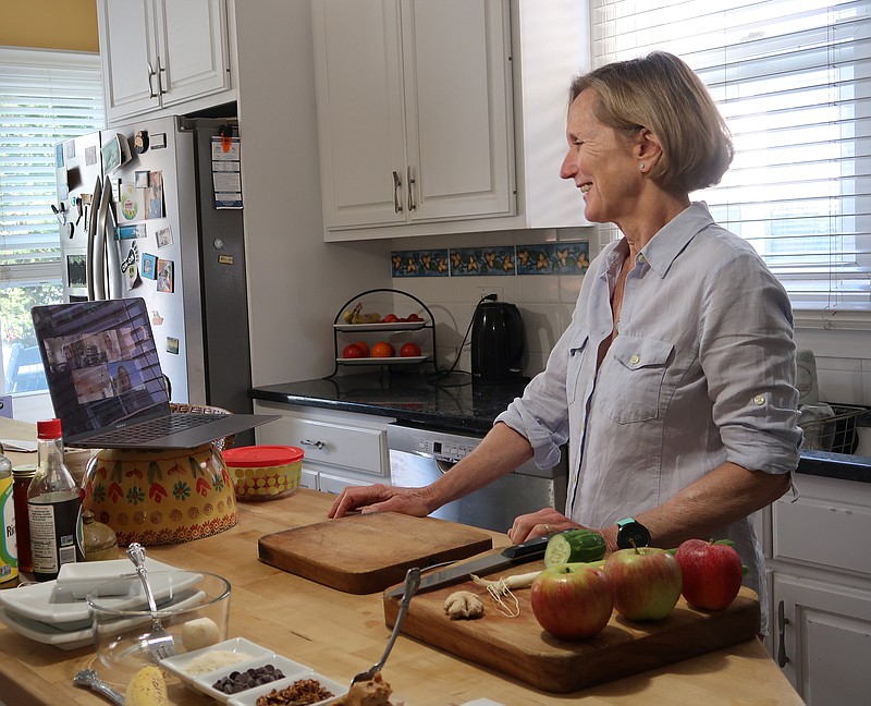 JFS/Healthy eating and gardening guru Bernadette Getzler teaches a virtual class of Village by the Shore members how to make honey ginger chicken and apple donuts using farm fresh ingredients