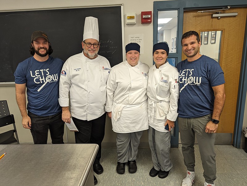 Provided/MRE Culinary Challenge winners Grace Carpenter and Isabella Burke pose with Culinary Arts Director Joseph Sheridan and Let's Chow Food Truck COO & Co-Founder Charlie Magovern and Founder, CEO & Head Chef Jordan Foley.