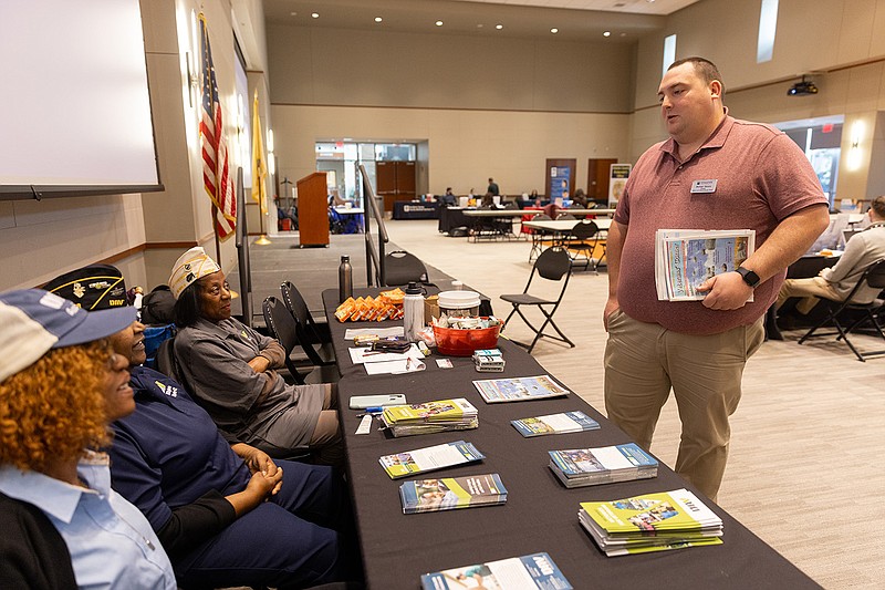 Provided/Michael Barany, the director of Stockton's Military and Veteran Success Center, talks to volunteers from the Disabled American Veterans of New Jersey at the Community and Veteran Resource and Wellness Fair on Nov. 1.