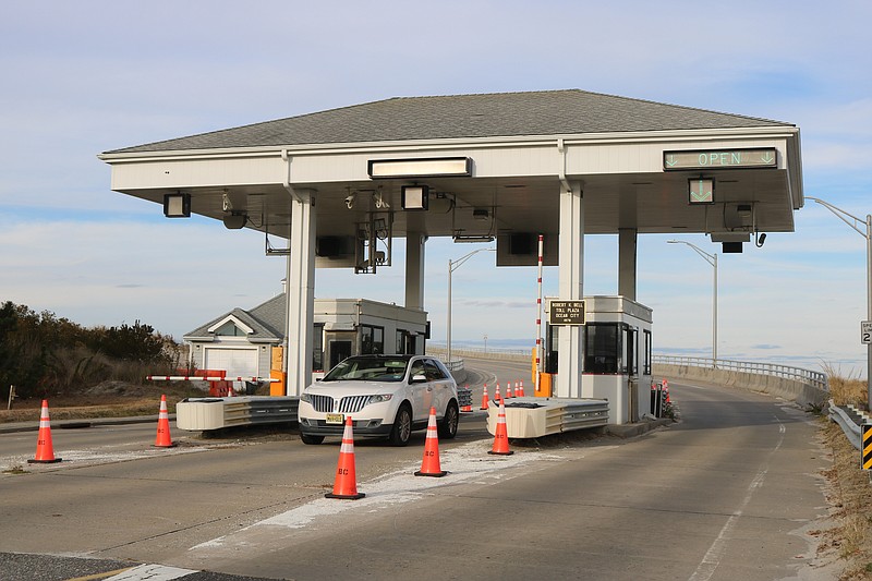 Traffic passes through the toll plaza at the Ocean City-Longport Bridge.
