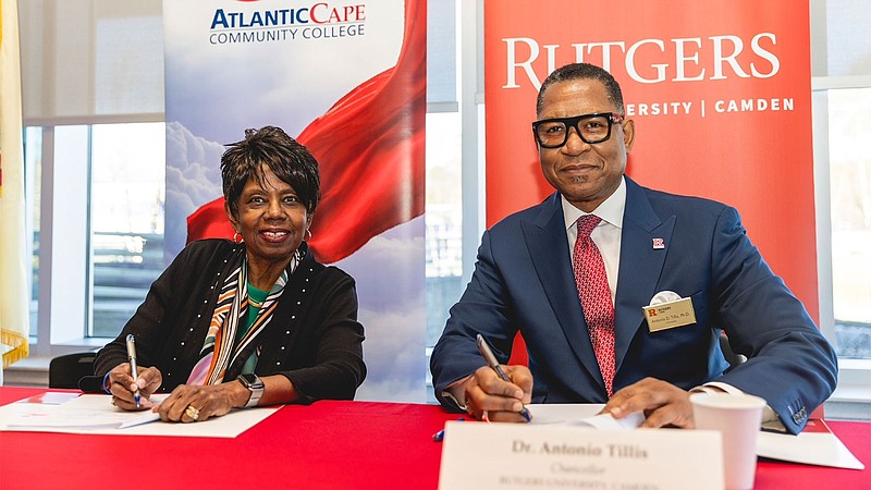 Atlantic Cape President Barbara Gaba and Rutgers UniversityCamden Chancellor Antonio D. Tillis 