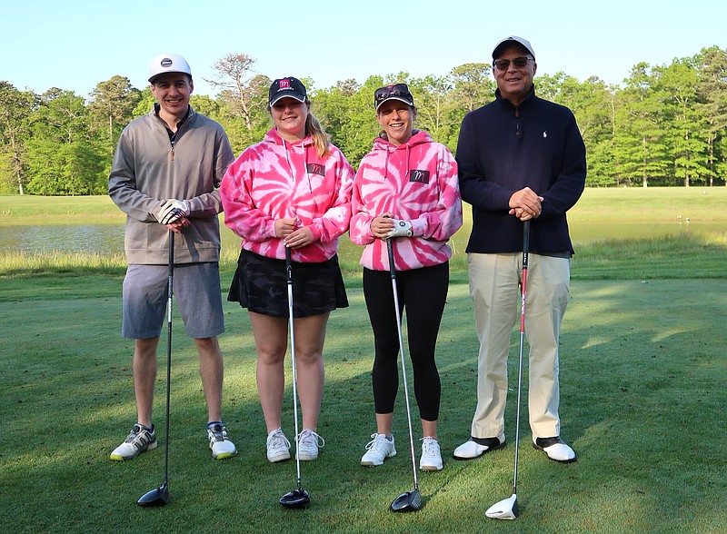 From left, James Shea, Eliana Pisetzner, Melissa Rosenblum, and Joe Jacobs hit the fairways at the NFI & The Brown Family Golf Tournament last year. 