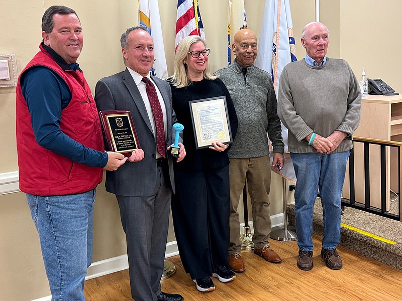 From left, Longport Commissioner Dan Lawler, Carl Tripician, Karen Tripician, Mayor Nicholas Russo and Commissioner Jim Leeds.