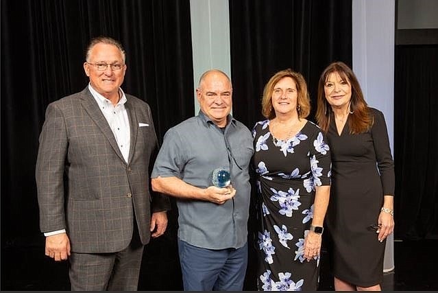 Eduardo Jimenez, second from left, with NJCCC Vice Chair John Wohlrab, Chair Linda Doherty and Executive Director JoAnn Gemende.
