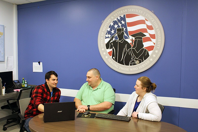 Provided/From left, first-year History major Richard Belmont, of Absecon, works in Stockton's Military and Veterans Success Center with Director Michael Barany and Assistant Director Ashley Jones. The center is located on Stockton's Galloway campus