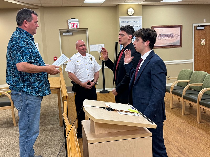 From left, Longport Commissioner of Public Safety Dan Lawler, Police Chief Frank Culmone, and Special Class I Officers John Veres and Nicholas R. Salvati